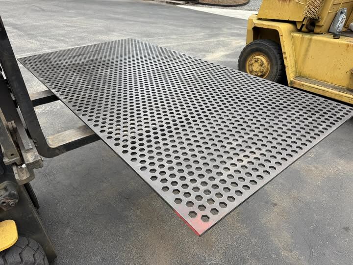 Full sheet of hex-perforated Power Plate headed into the shop for cutting